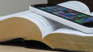 Bible and cell phone