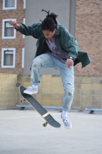 man pivoting on skateboard