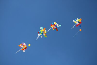 Baloons flying away
